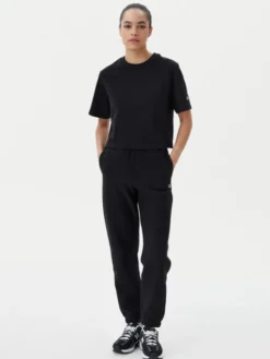 Champion Spodnie dresowe 117872 Czarny Slim Fit