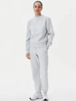 Champion Spodnie dresowe 117872 Szary Slim Fit