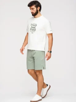 Ombre Szorty materiałowe OM-SRSK-0196 Zielony jasny Regular Fit