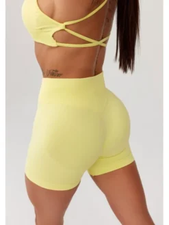 ROUGH RADICAL Szorty sportowe SEAMLESS GLOW SHORTS Żółty Slim Fit