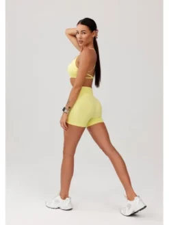 ROUGH RADICAL Szorty sportowe SEAMLESS GLOW SHORTS Żółty Slim Fit