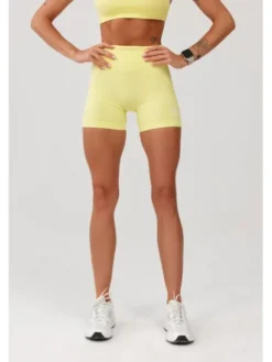 ROUGH RADICAL Szorty sportowe SEAMLESS GLOW SHORTS Żółty Slim Fit