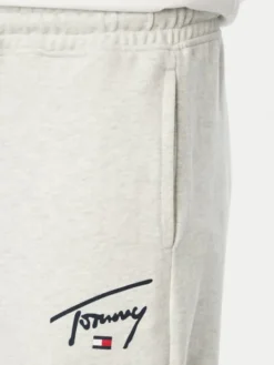 Tommy Jeans Spodnie dresowe DM0DM23593 Szary jasny Regular Fit