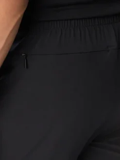 Under Armour Spodnie dresowe Tech™ Utility 6013802 Czarny Regular Fit