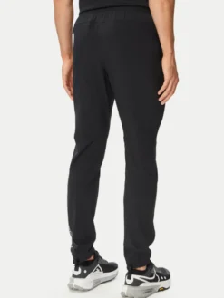 Under Armour Spodnie dresowe Tech™ Utility 6013802 Czarny Regular Fit