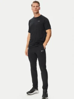 Under Armour Spodnie dresowe Tech™ Utility 6013802 Czarny Regular Fit